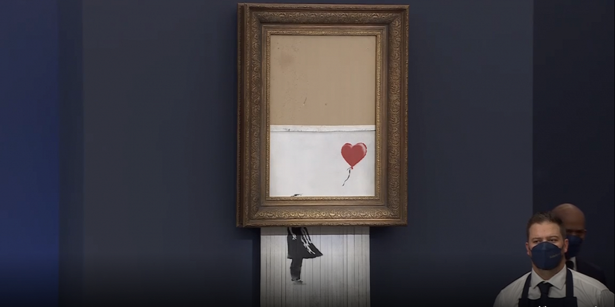 Un tableau partiellement détruit de l'artiste Banksy vendu pour 18,582 millions de livres sterling chez Sotheby's Un tableau partiellement détruit de l'artiste Banksy vendu pour 18,582 millions de livres sterling chez Sotheby's