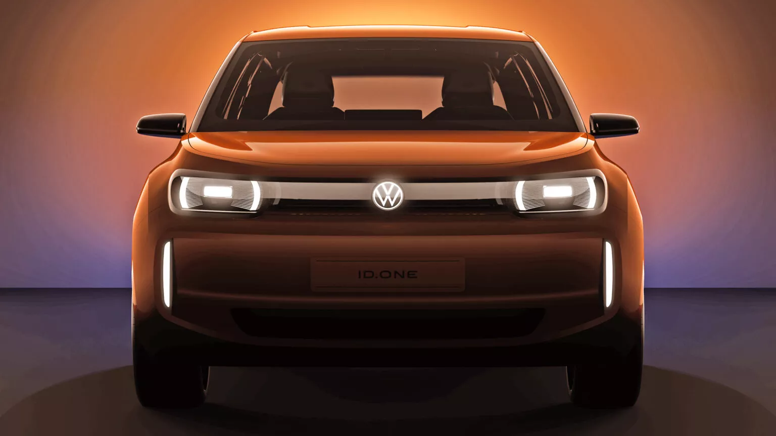 Premier teaser de la nouvelle voiture électrique de Volkswagen avec "ID.One" écrit à la place de la plaque d'immatriculation.